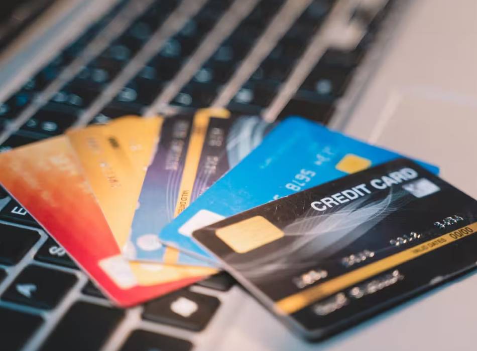 Advisor reviewing a credit report and credit card